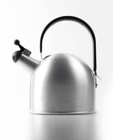 A metal kettle against a white backgroundの写真素材