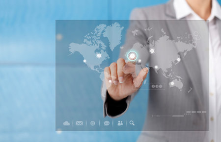 Businesswoman in front of visual touch screen.の写真素材