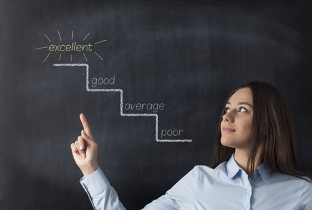 Drawing ladder of success in blackboardの写真素材