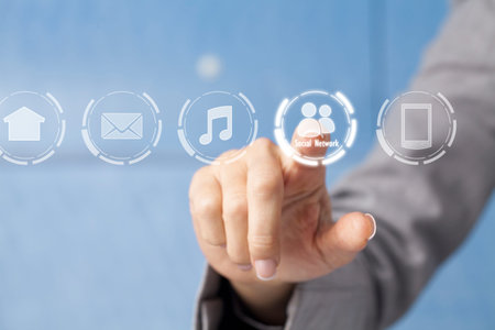 Businesswoman in front of visual touch screen.