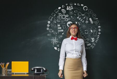 Businesswoman idea concept on blackboardの写真素材