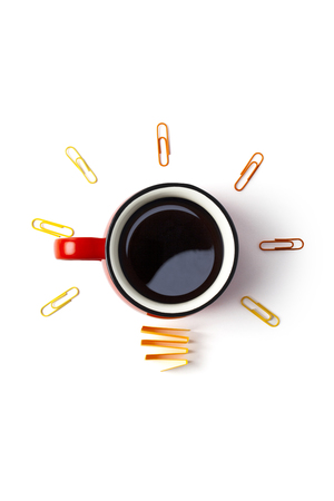 Inspiration concept coffee cup light bulb metaphor for good ideaの写真素材