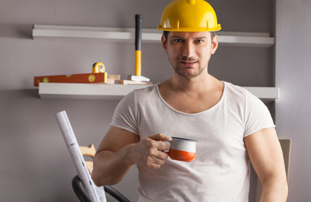 Worker on a break drink coffee and have rest