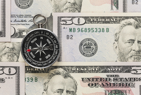 Compass on dollar banknoteの写真素材