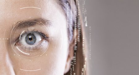 Young woman's eye and high-tech concept, augmented reality display, Iris verification, wearable computingの写真素材