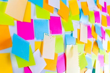 Whiteboard covered with adhesive notes