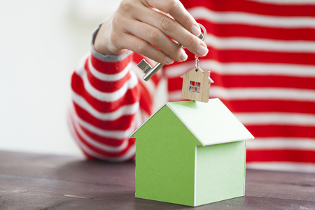 House purchase plan concept with house model and keysの写真素材