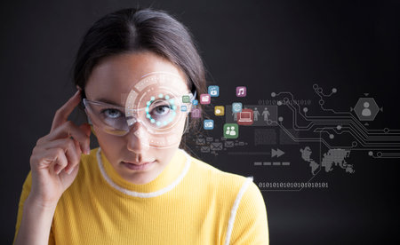 Young woman looking at virtual graphics