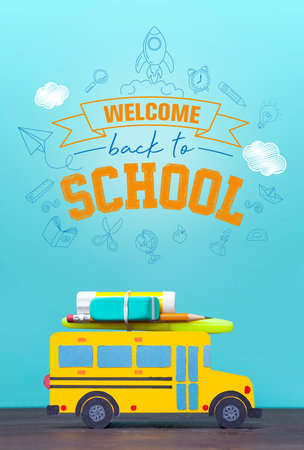 Back to school concept. Paper-cut model yellow school bus on colour background