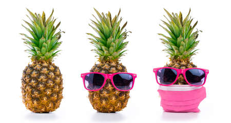 Series of pineapples. Pineapple ordinary, pineapple in sunglasses and pineapple in sunglasses with face maskの写真素材
