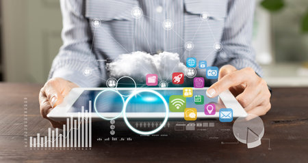 Businesswoman using tablet payments online shopping and network connection icons on hologram virtual...