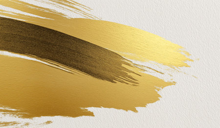 Gold paint brush stroke on white paper background. Abstract art background.の素材
