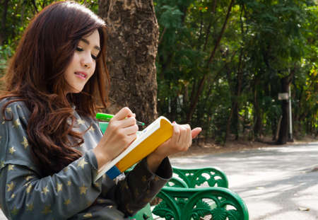 Woman reading a bookの写真素材