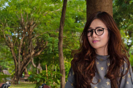 Woman smile in gardenの写真素材