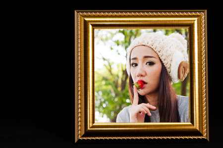 Frame of woman photo with black isolated background