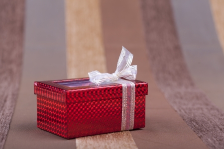 A beutiful red box on an artistic background macro studio shotの写真素材