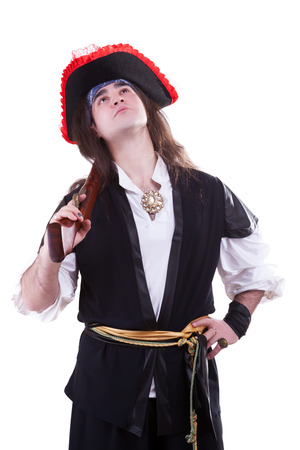 Pirate with a scar on hand and a gun isolated on white backgroundの写真素材