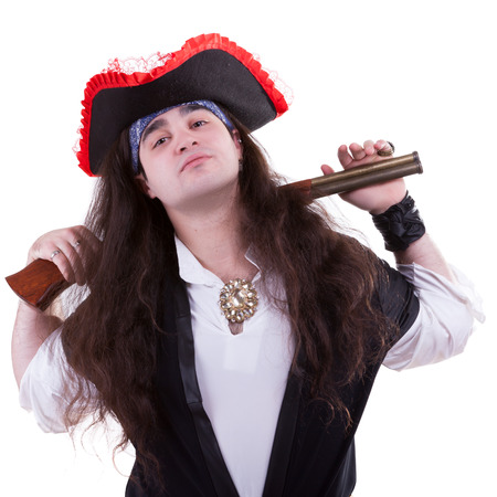 Pirate with a gun isolated on white background studio shootingの写真素材