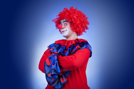 Happy clown on blue background
