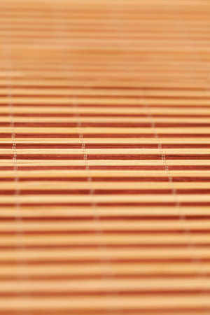 Sushi mat with blurred background. Atistic photoの写真素材