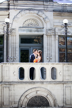 Wedding photosession of bride and groom in the city. Fellings. Love and passionの写真素材