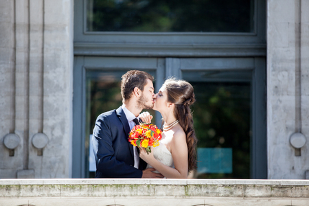 Wedding photosession of bride and groom in the city. Fellings. Love and passionの写真素材