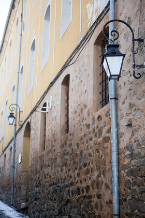 Rustic street lamp in outside photoの写真素材