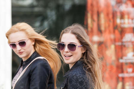 Girls taking a walk and smiling at camera. Lifestyleの写真素材