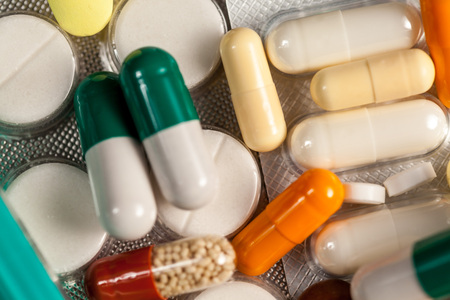 Drugs, pills and medication on table in close up photo. Healthcare treatmentの写真素材
