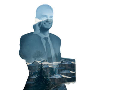 Happy businessman talking on the phone with folder in hand in double exposure image in studio shooting. Business style and successul businessmanの写真素材