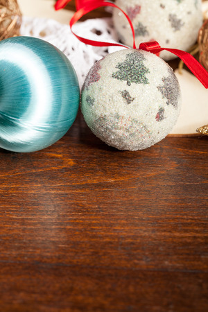 Christmas balls decorations on wooden table. Studio photoの写真素材