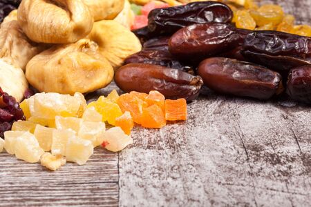 Dried fruits on wooden background. Healthy foodの写真素材
