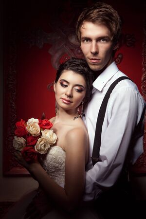 Groom and bride in vintage interior. Happy couple. Wedding photographyの写真素材