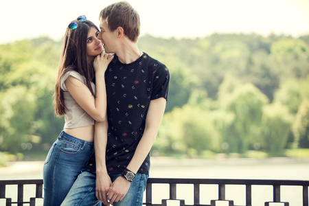 Girl and boy spending quality time toghether outsideの写真素材