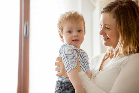 Mother and child son having fun time toghether. Family lifestyleの写真素材