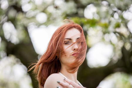 Romantic woman in white dress. Outdoor shooting. Lifestyle and relaxationの写真素材