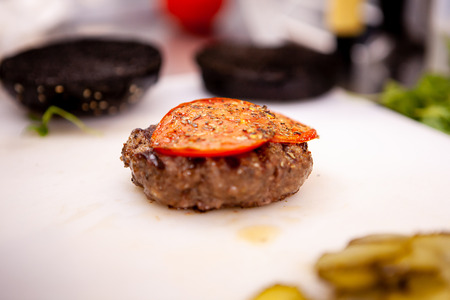 Delicious burger meat made by chef cook. In kitchen restaurantの写真素材