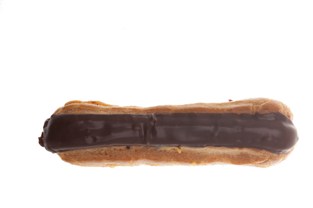 Chocolate covered eclaire isolate on white background. Tasty dessertの写真素材