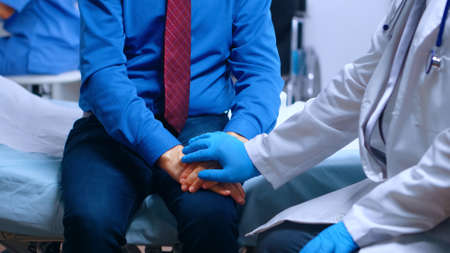 Close up of old man breathing with difficulties while wearing a respiratory oxygen mask. Coronavirus...