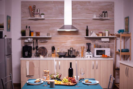 Festive food on kitchen table for relationship celebration.の写真素材