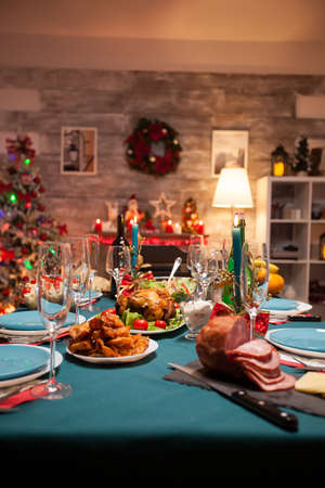 Garnished delicious roasted chicken on the table for christmas.の写真素材