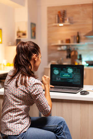 Happy woman hacker after cracking firewall of government and getting access granted. Programmer...