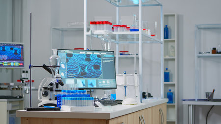 Chemist laboratory with nobody in it modernly equipped prepared for pharmaceutical innovation using high tech and microbiology tools for scientific research. Vaccine development against covid19 virusの写真素材
