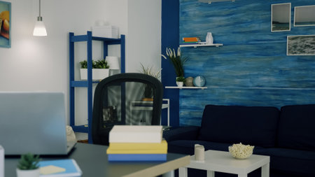 Office living room with nobody in it, place of home work, workplace indoors concept with open laptop...