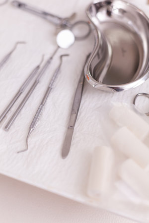 Close up of oral dental instruments ready for dentistry teeth surgery in stomatology hospital room....