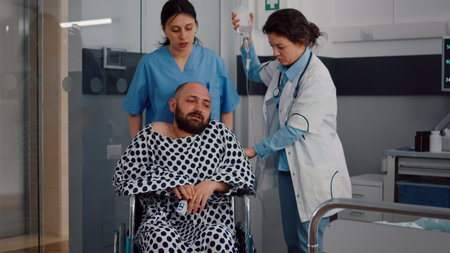 Sick man resting in bed during respiratory recovery in hospital ward during medical physiotherapy....