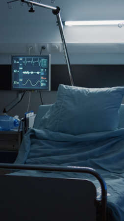 Empty hospital ward with modern medical equipment, healthcare room for treating patients with...