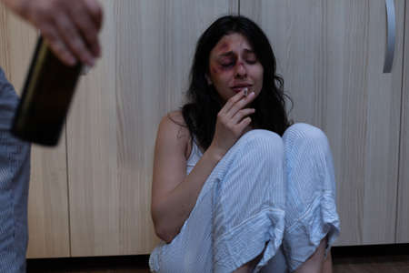 Close up of abused woman crying because of domestic violence and social problems. Depressed wife...