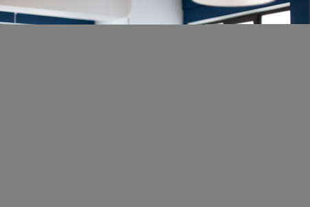 Coworkers engineer working on modern cad program developing industrial metallic construction. Architects designer studying prototype idea on pc showing digital company software with gearsの写真素材