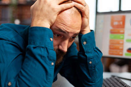 Focused concentrated executive manager brainstorming project ideas working at company presentation...